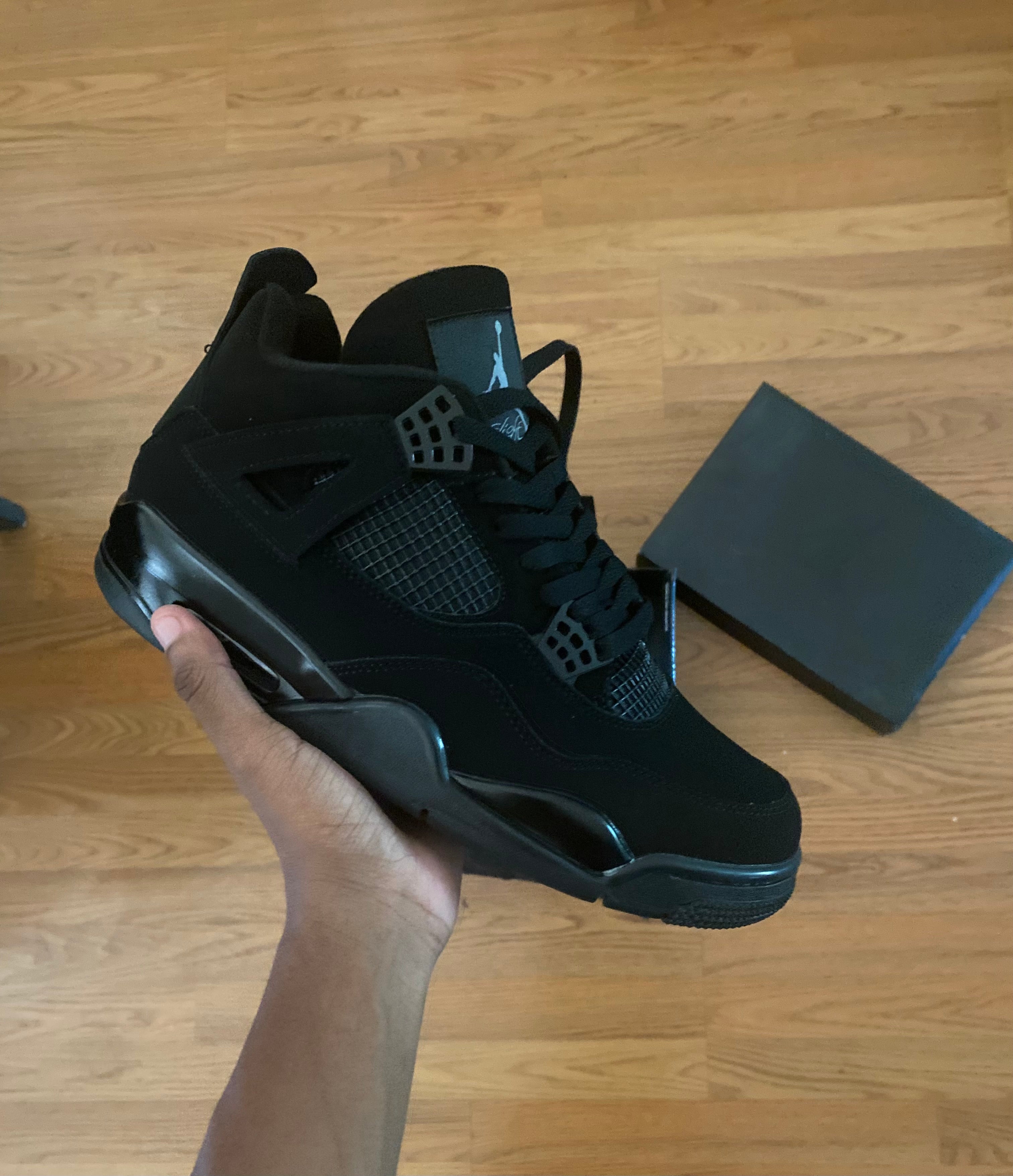 Air Jordan 4 Retro “Black Cat” Sneakers